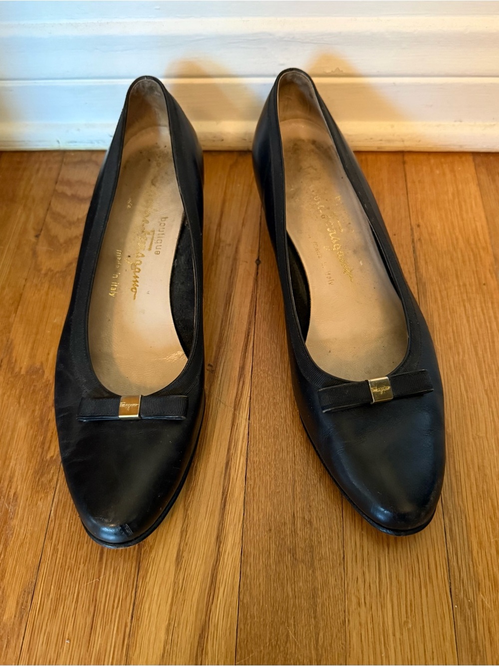 Salvatore Ferragamo Black Leather Bow Flats with Gold Accent